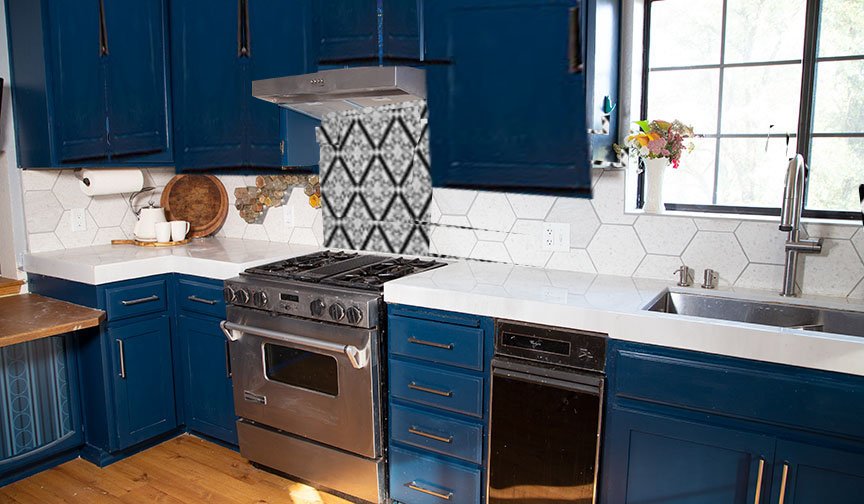 KItchen reno with apanel of patterned tile behind the stove.